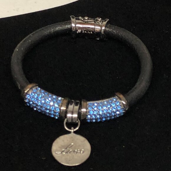 Joan Boyce Jewelry - Joan Boyce Blue Crystal and Black Leather Charm Bracelet with Magnetic Closure *